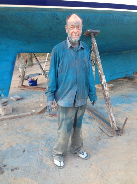 One weary worker after a day of sanding back the keel