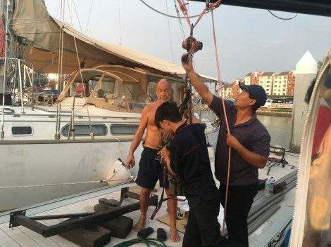 engine hoisted to jetty